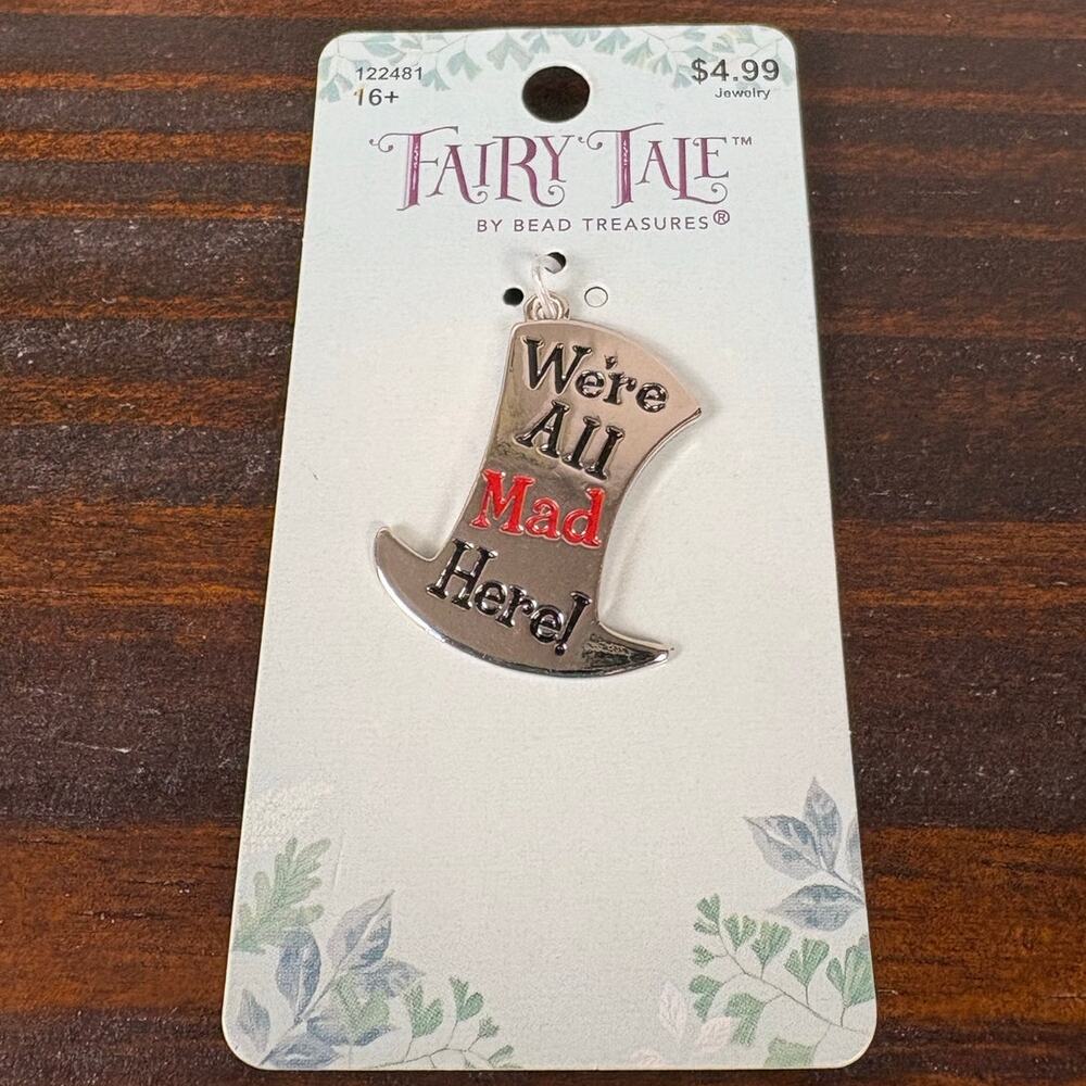 NWT Fairytale by Bead Treasures Hatter Metal “We’re All Mad Here” Hat Pendent